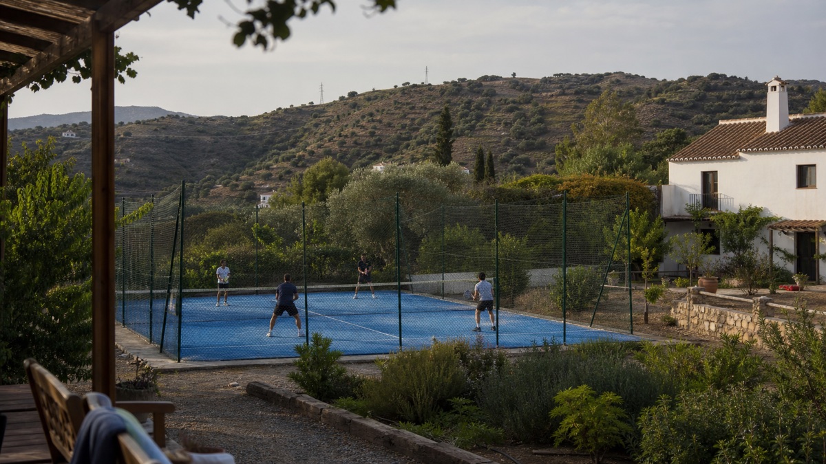 Padel doubles beside a finca in the hills near Málaga